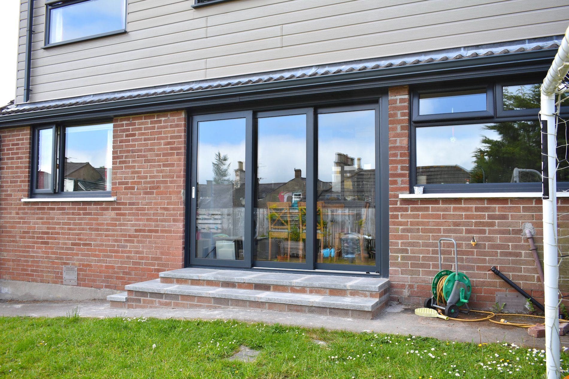 Aluminium Triple Track Sliding Doors in Grey