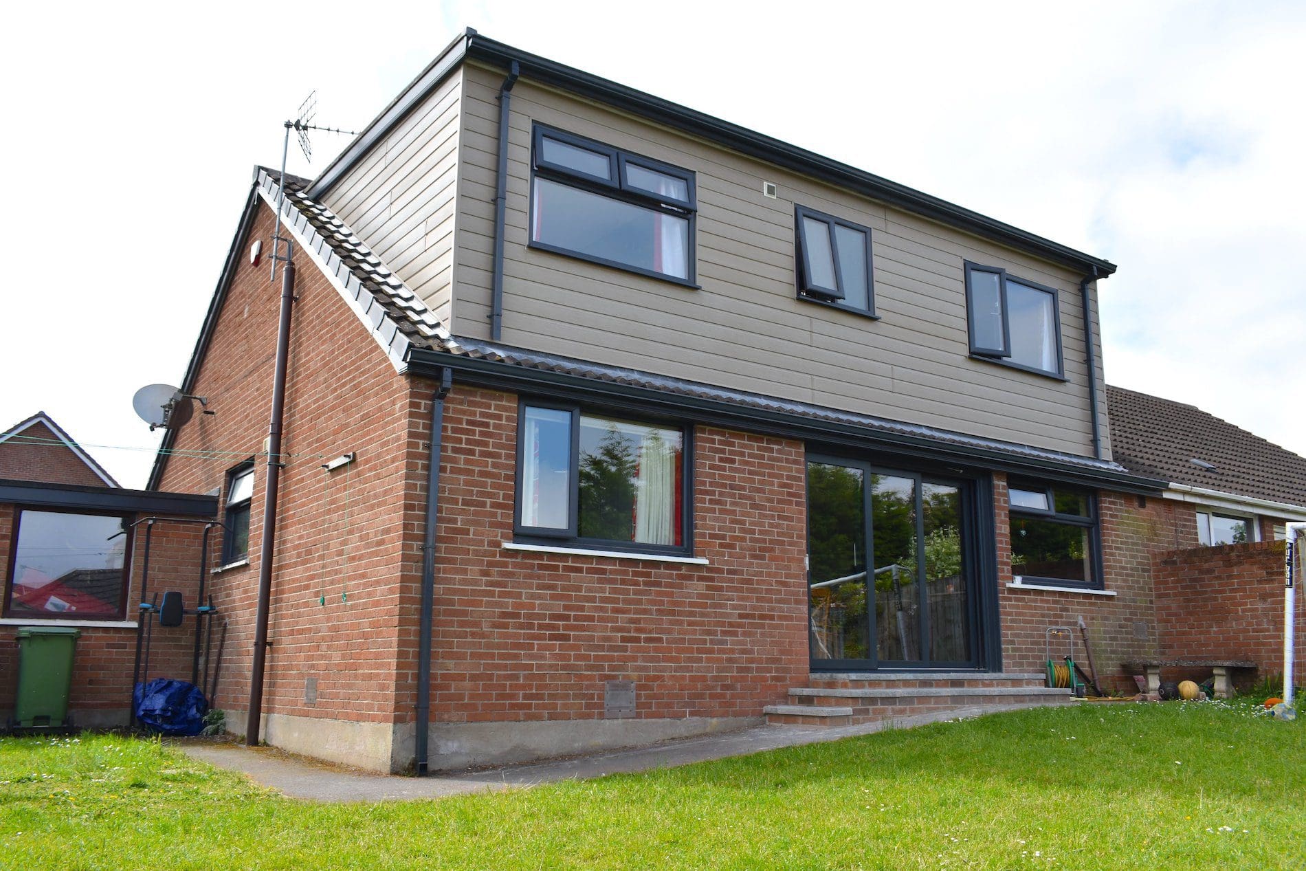Casement windows and sliding patio doors in grey