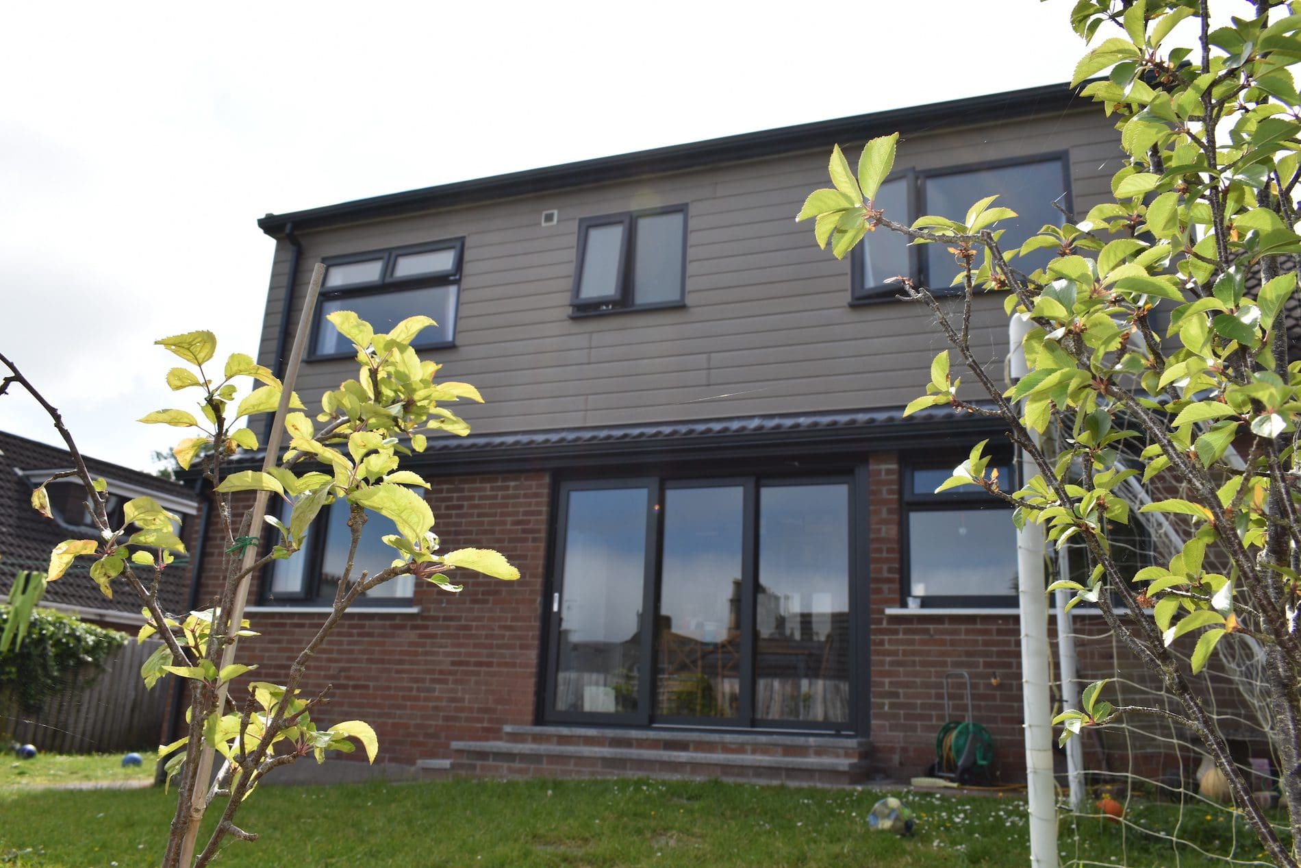 Casement windows and sliding patio doors in grey
