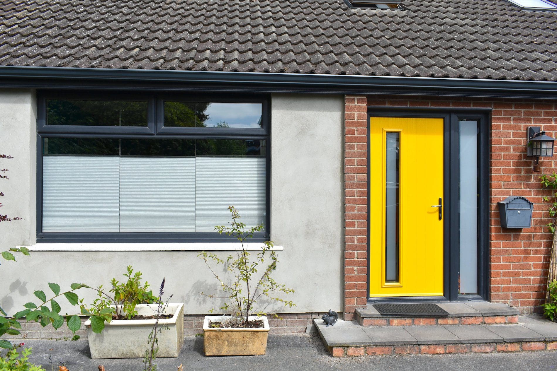 Yellow composite door and sandblasted glass