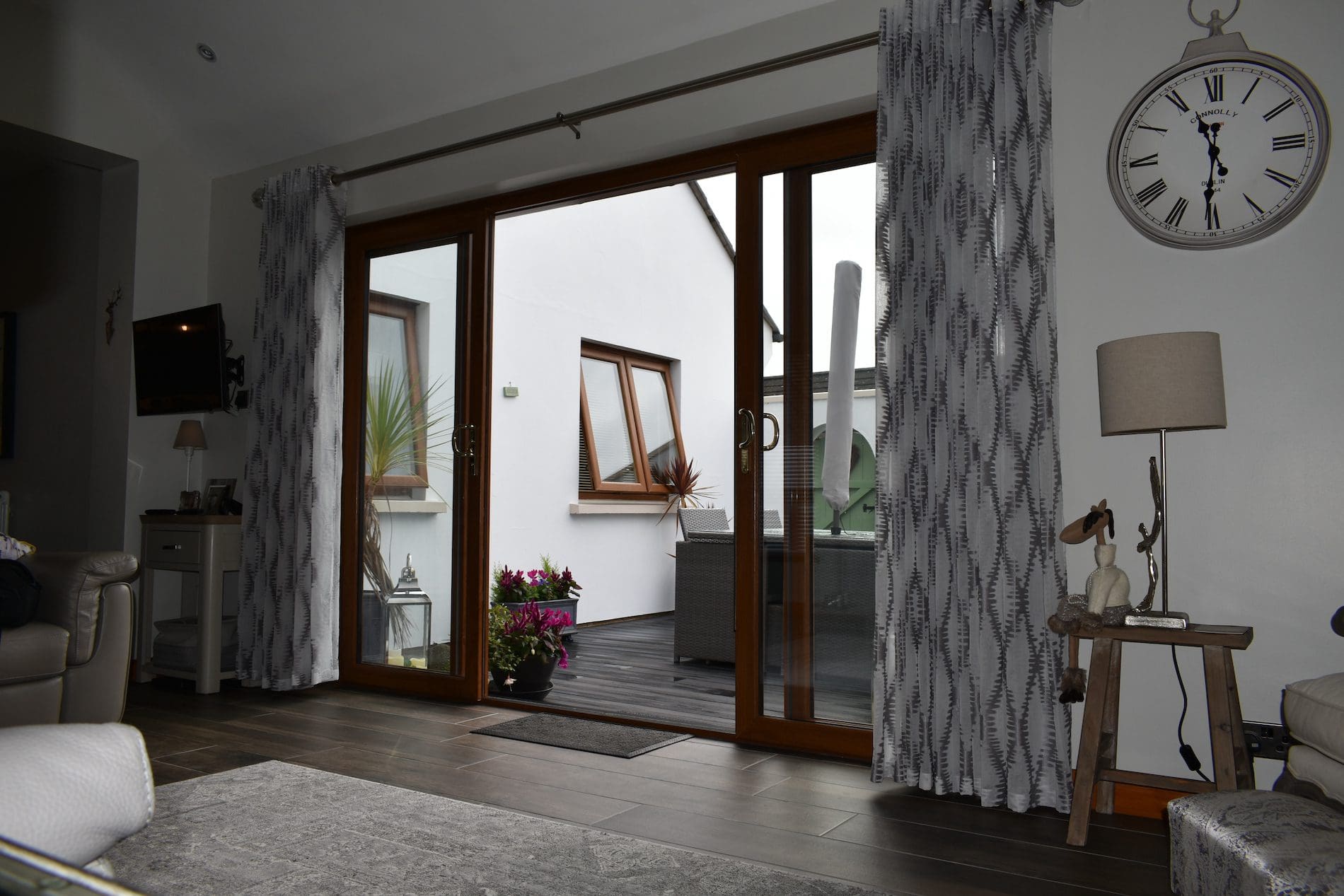 Oak woodgrain uPVC sliding doors