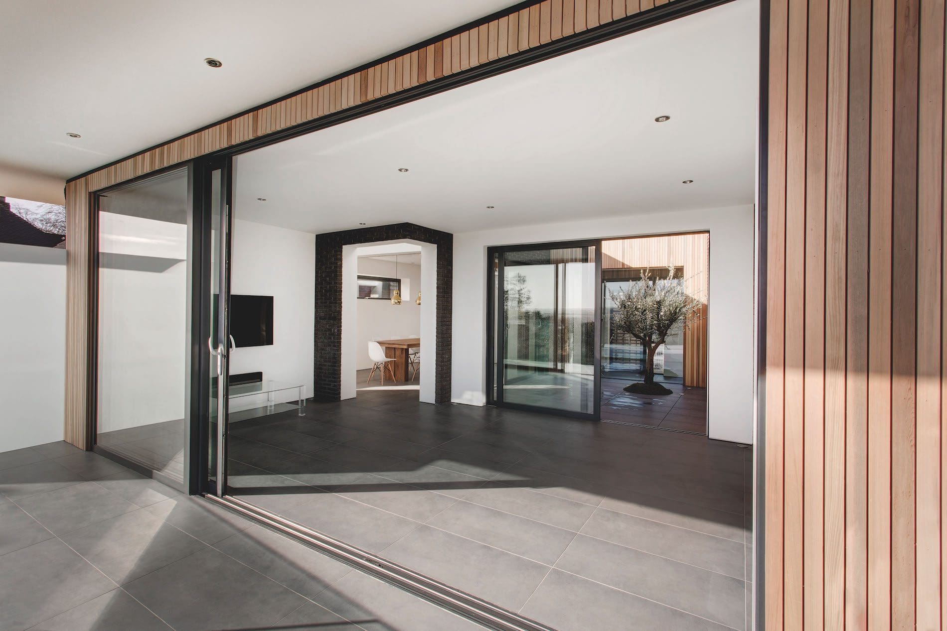 Open triple track sliding doors