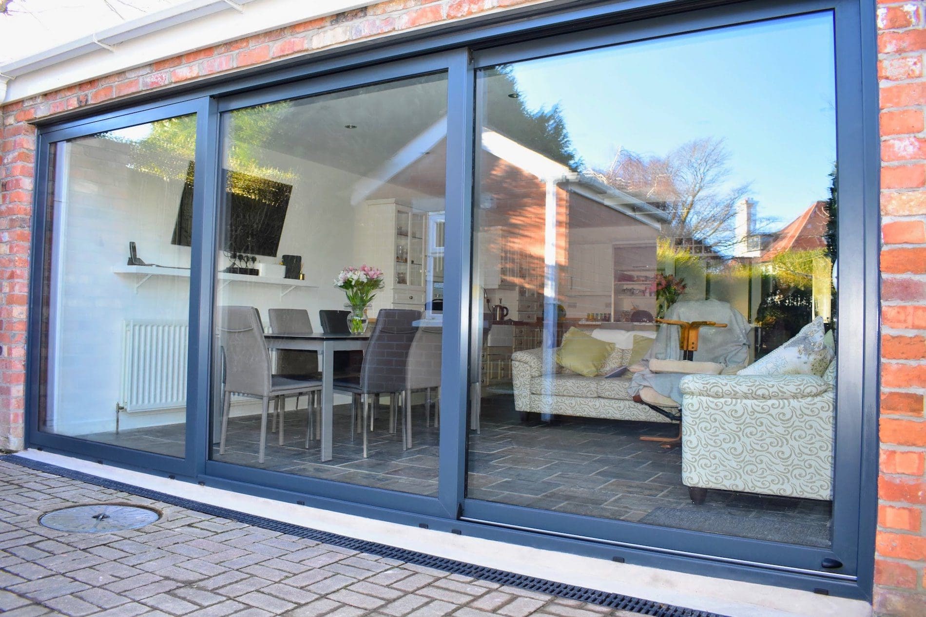 Anthracite grey triple track sliding doors
