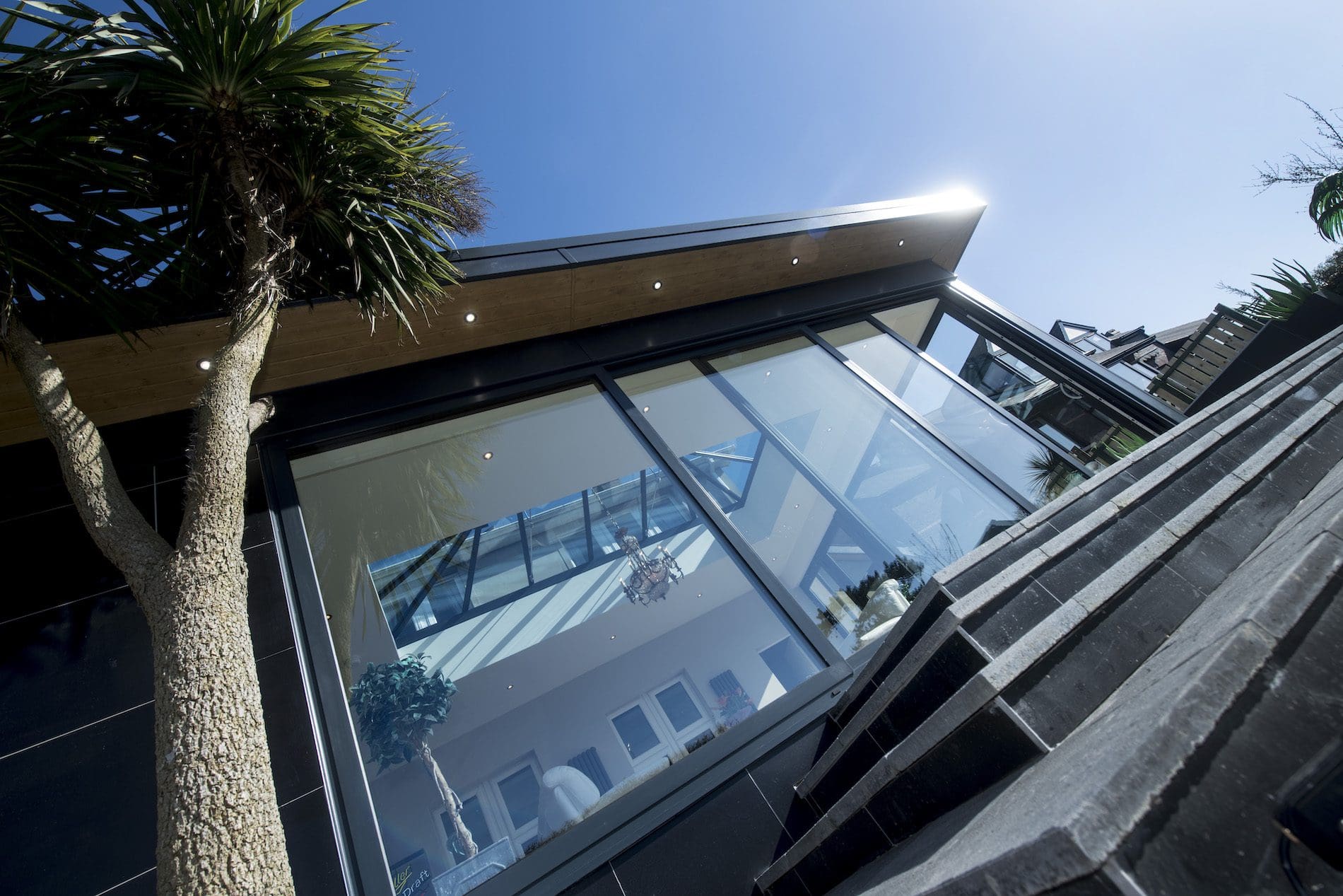 Pod Sunroom Extension With a Korniche roof lanterns